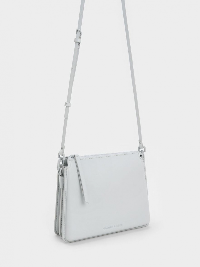 Geanta Crossbody Charles & Keith Camelia Trapeze Gri Deschis | 675MSNQZR