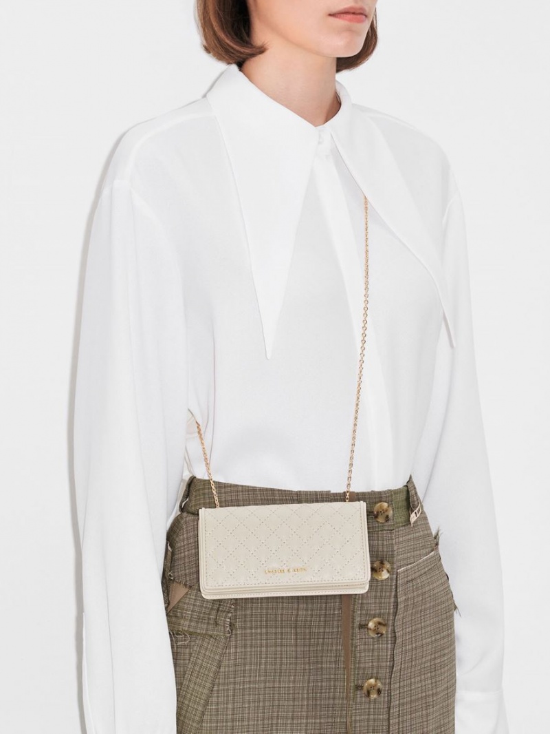 Pouches Charles & Keith Matlasat Albi | 150FJOGUM